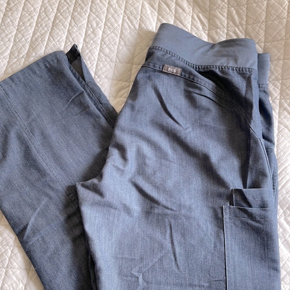 Figs like a jean color, size small scrub pants like new condition